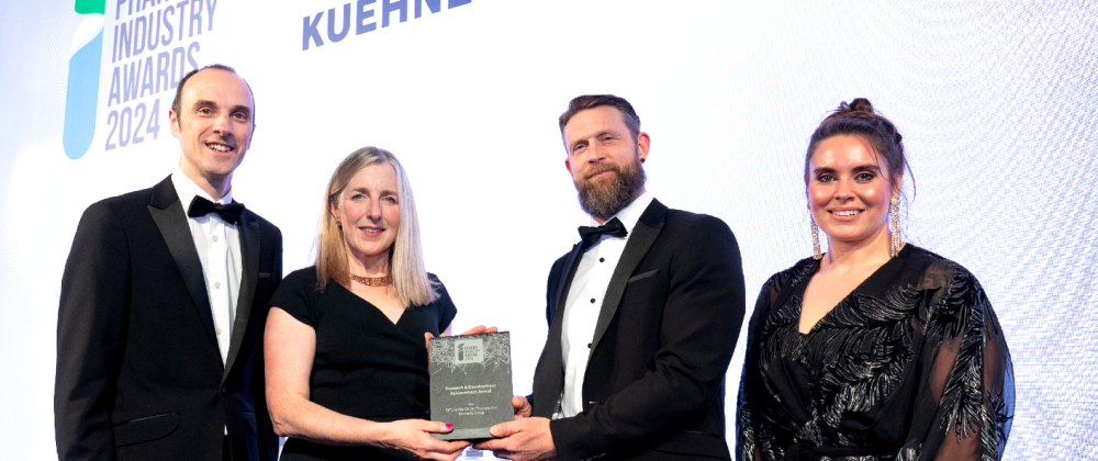 The OTRG team winning an award at a research event