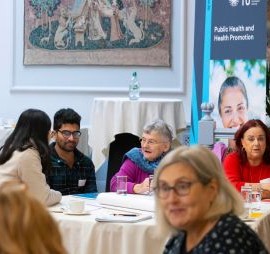 A group of people at a research conference