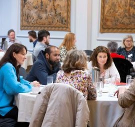 A group of people at a research conference
