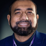 Mujahid T